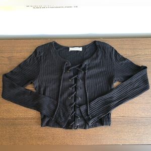 American threads lace-up black sweater